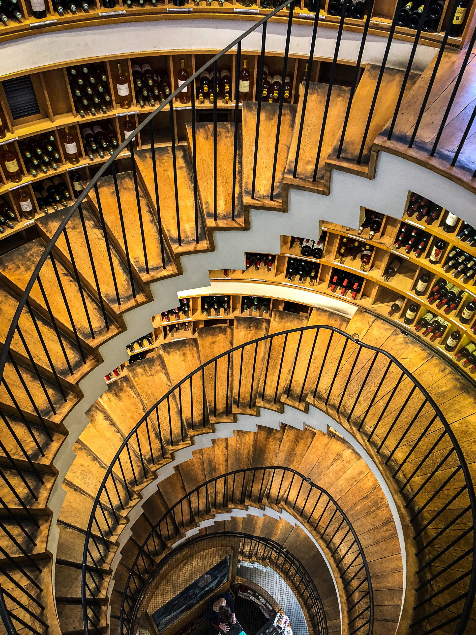 Stairs and bottles of wine in L'Intendant in Bordeaux