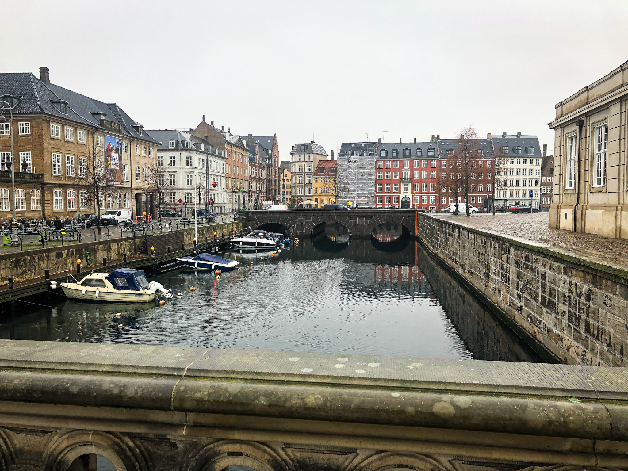 Canals in Copenhagen with coloured buildings and boats