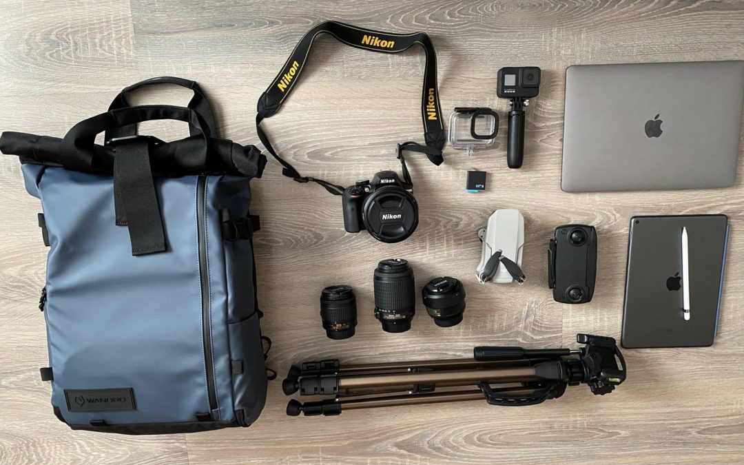 Photography gear with camera, drone, MacBook Pro