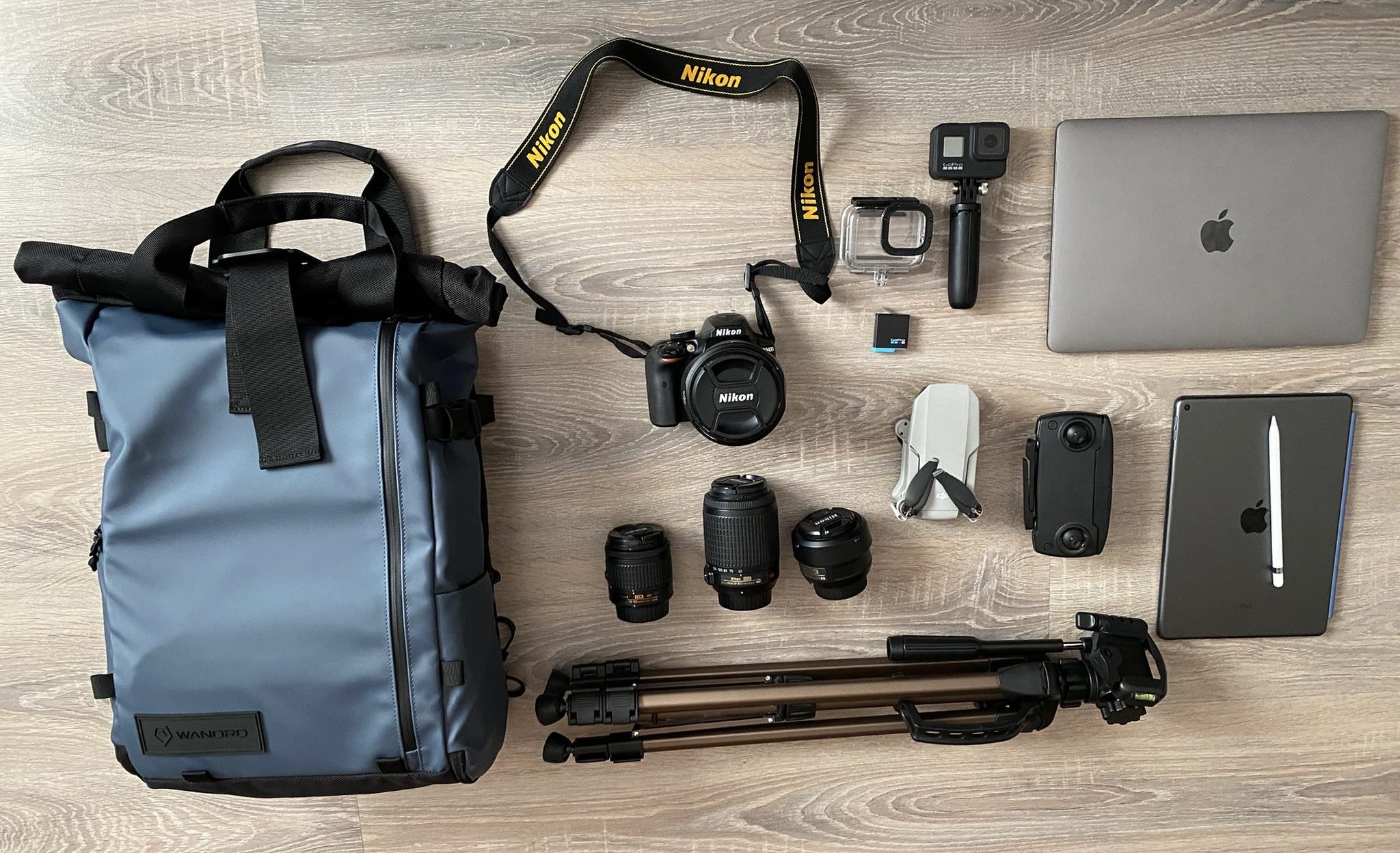 Photography gear with camera, drone, MacBook Pro 