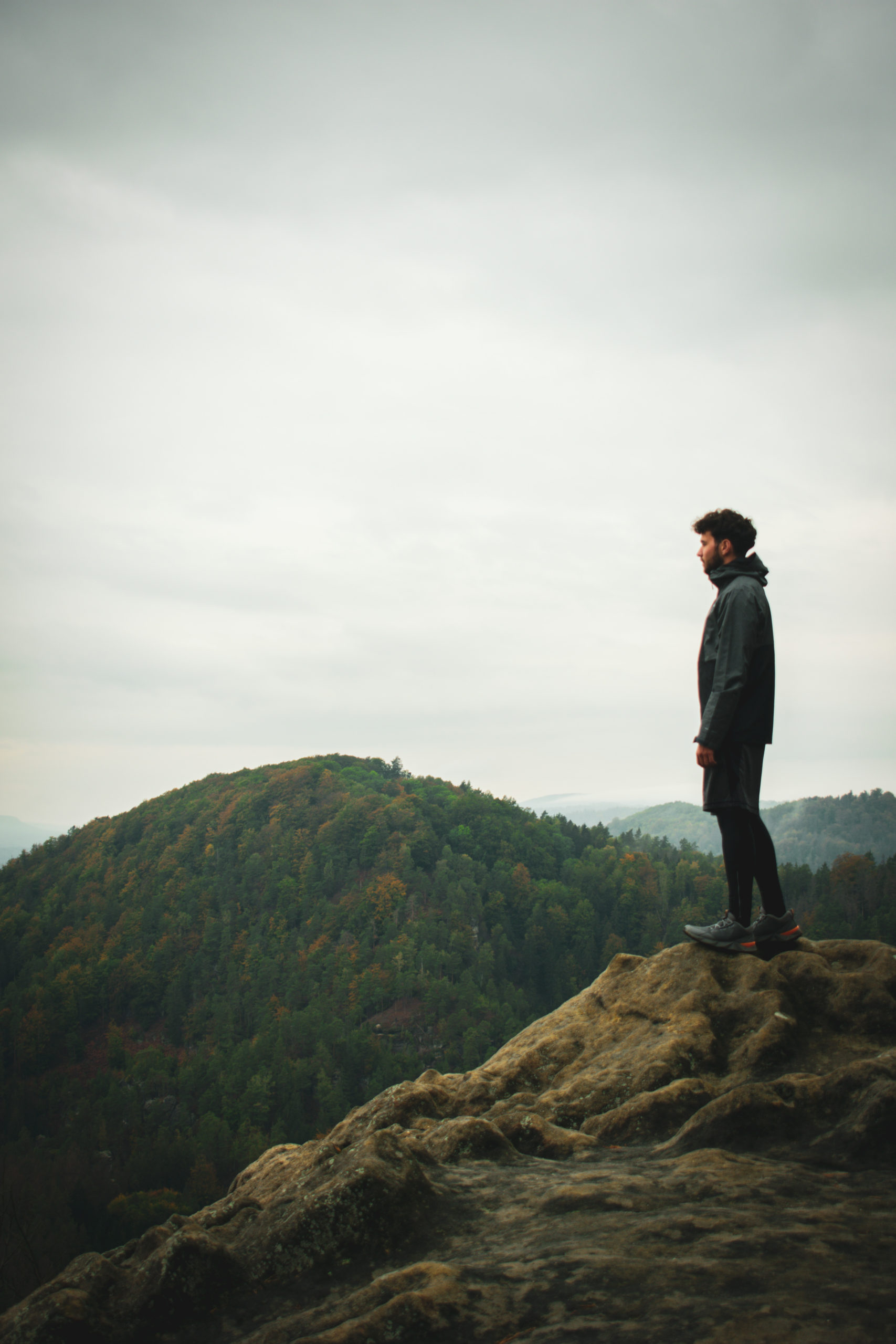 Man standing in a Mariina Skala in Bohemian Switzerland National Park in Czech Republic